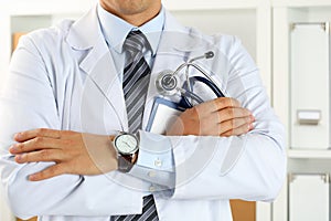 Male medicine therapeutist doctor hands crossed on his chest