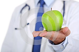 Male medicine therapeutist doctor hands holding green fresh ripe