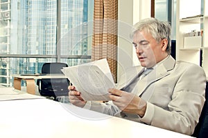 Male middle-aged working with documents