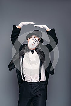 Male mime actor fun mimic performing