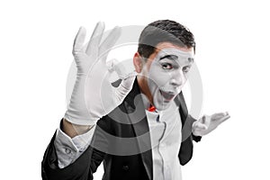 Male mime showing OK gesture