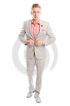 Male model closing his light grey suit