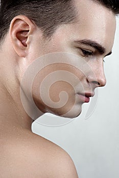 Male model with drops on face