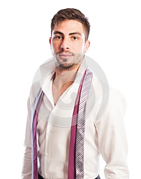 Male model with open collar shirt and two neckties hanging