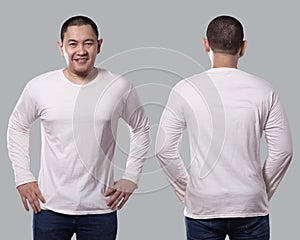 Male model wear white long sleeve t-shirt isolated on grey background, front and back design for mock up template copy space