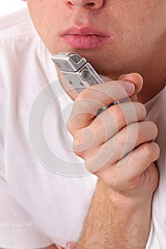 Male mouth and dictaphone photo