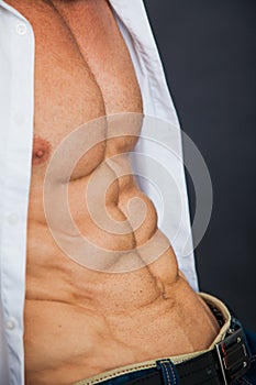 Male muscular torso with six pack abs