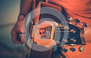 Male Musician Playing Acoustic Guitar