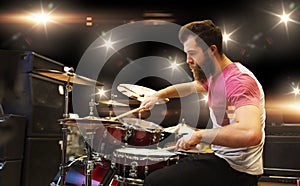 Male musician playing cymbals at music concert