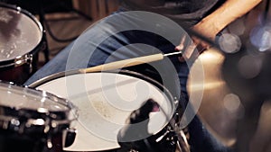 Male musician playing drums and cymbals at concert