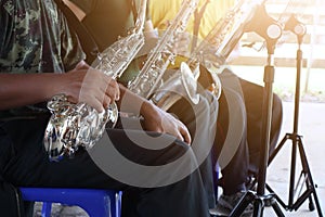 a male musician playing a saxophone Musical instruments Selectable focus