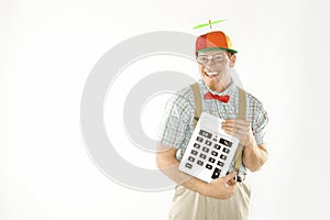 Male nerd holding calculator.