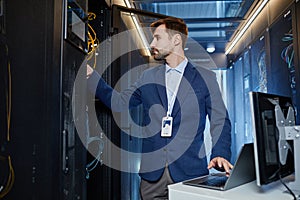 Male Network Engineer in Server Room