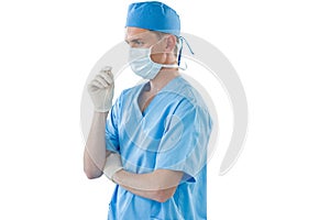 Male nurse wearing surgical mask and gloves