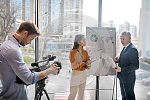 Male operator preparing for the video recording