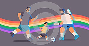 male parents playing football with little son gay family transgender love LGBT community concept