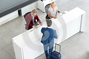 Male passenger on reception