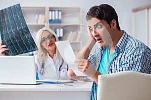 The male patient angry at expensive healthcare bill photo