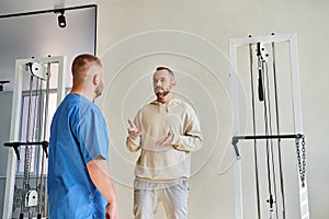 male patient discussing treatment plan with
