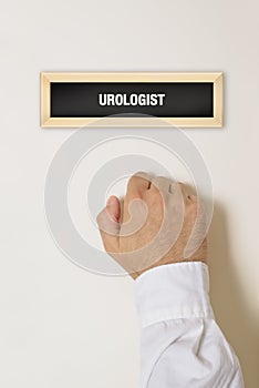 Male patient knocking on Urologist door