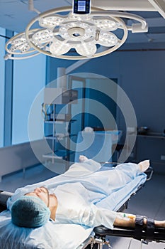 Male Patient prepared by a team of anesthetists for abdominal surgery, hospital