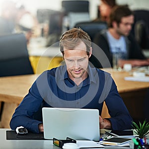 Male person, laptop and working with notebook, stationary and desk in office for company. Businessman, project and