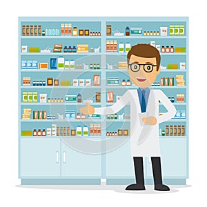 Male pharmacist on medicine background