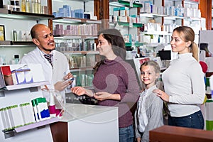 Male pharmacist in pharmacy