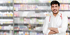 Male pharmacist working at the pharmacy.