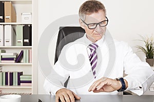 Male Physician Watching Wrist Watch