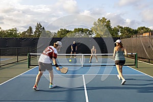 Male Pickleball Player Prepares to Hit