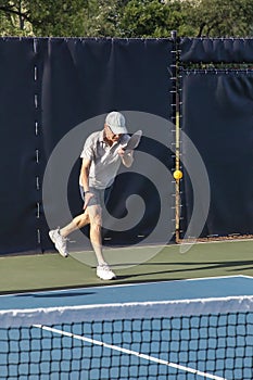 Male Pickleball Player Serving