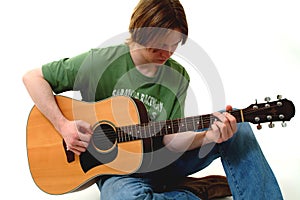 Male Playing Acoustic Guitar