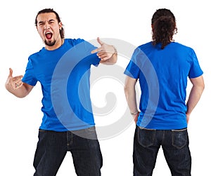 Male pointing at his blank blue shirt