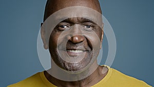 Male portrait mature african american man looking camera smiling with white toothy smile joyful ethnic senior male