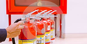 Male professional inspection fire extinguisher,safety concept