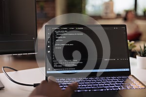 Male programmer using coding encryption interface