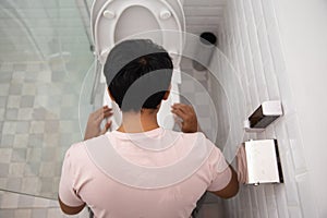 Male puke on toilet shoot photo