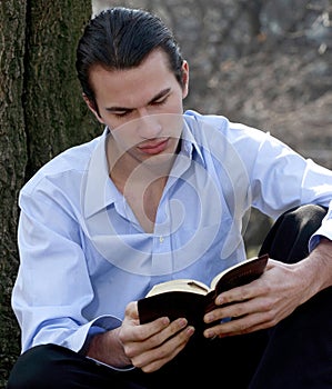 Male reading Bible