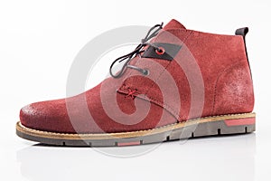 Male red leather boot on white background, isolated product.