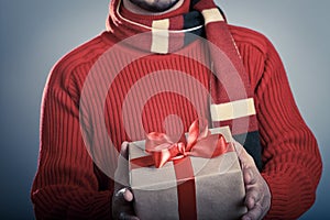 Male with red ribbon gift box