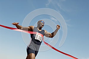 Male Runner Winning Race