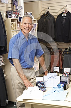 Male sales assistant in clothing store