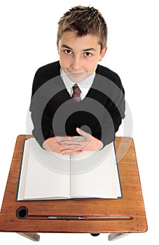 Male school student looking up