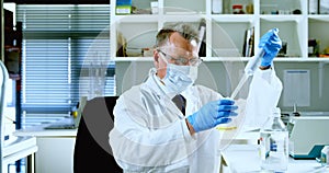 Male scientist experimenting in laboratory 4k