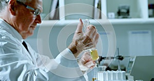 Male scientist experimenting in laboratory 4k