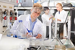 Male scientist working at biochemical laboratory