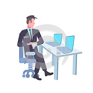 Male security guard worker looking laptop screen man in uniform sitting at workplace desk surveillance room white