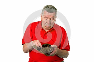 Male senior with empty wallet