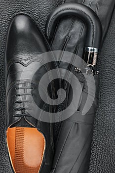 Male set of fashion accessories, shoes, umbrella, gloves